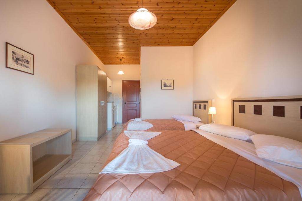 Posteľ alebo postele v izbe v ubytovaní Dimaras Apartments