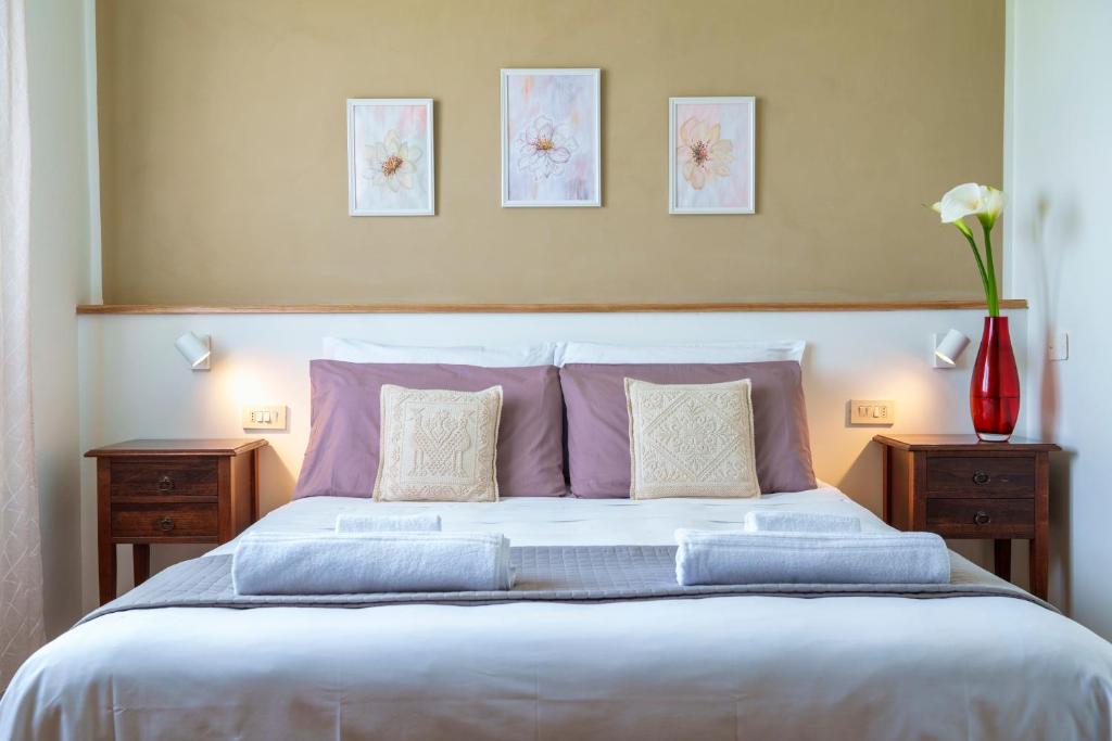 A bed or beds in a room at Agriturismo San Francesco