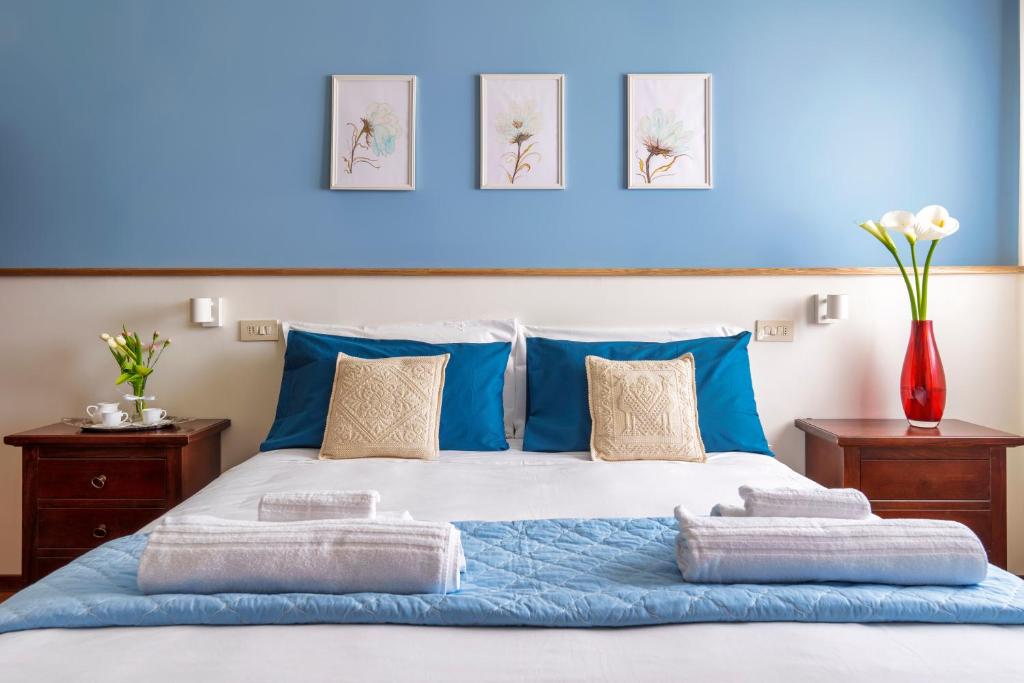 A bed or beds in a room at Agriturismo San Francesco