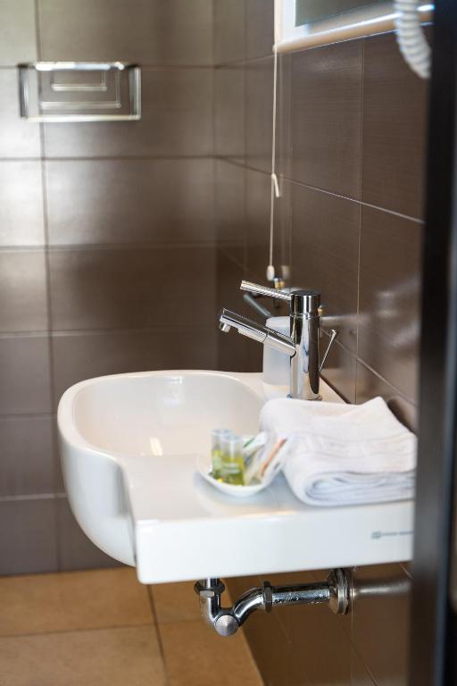 Koupelna v ubytování Corte dei Melograni Hotel Resort