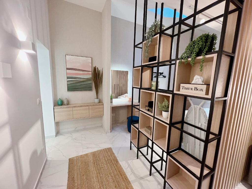 Postel nebo postele na pokoji v ubytování Zeus Design Apartmenthaus