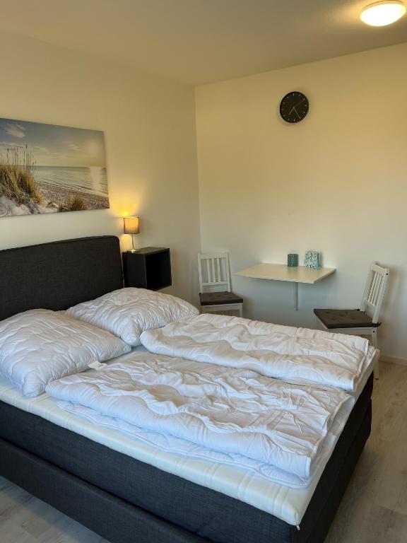 Postel nebo postele na pokoji v ubytování Mimi's Ostseeglück