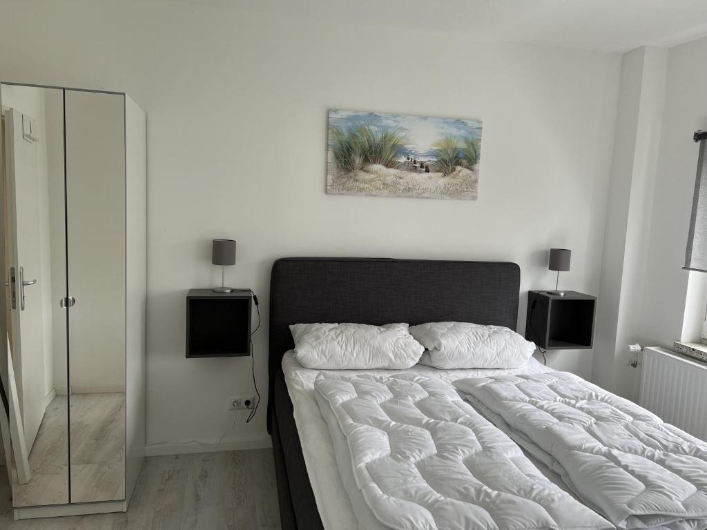 Postel nebo postele na pokoji v ubytování Mimi's Ostseeglück