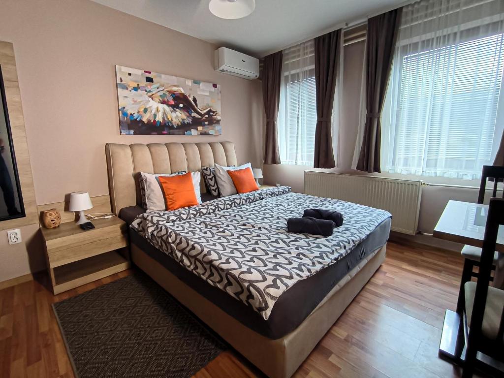 Postel nebo postele na pokoji v ubytování Studio Apartments Maksimović