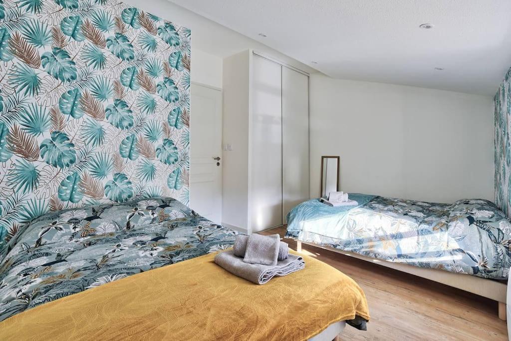 Postel nebo postele na pokoji v ubytování appartement Karibu à Lagnieu