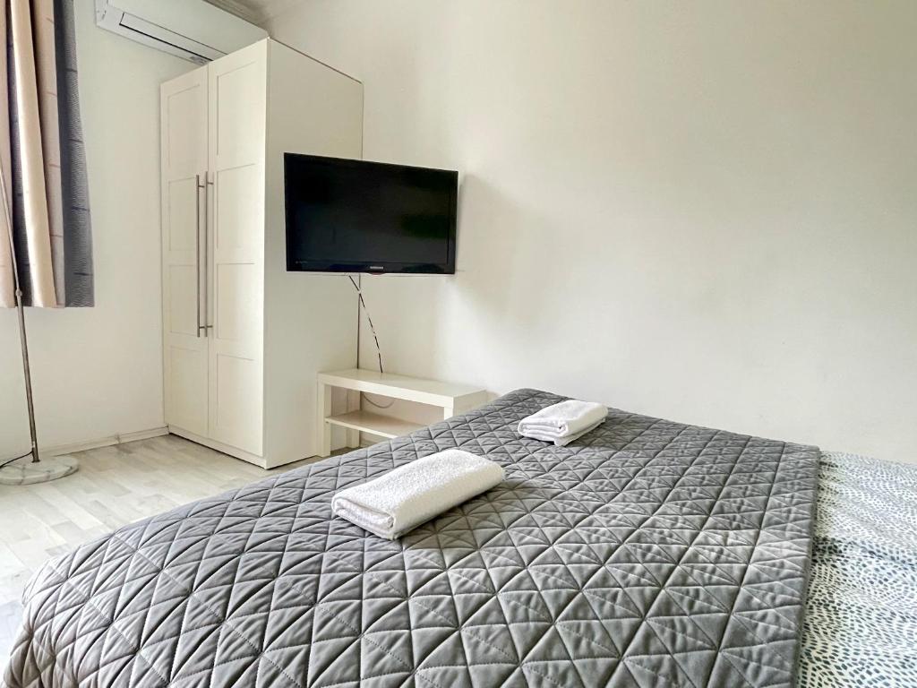 Posteľ alebo postele v izbe v ubytovaní Bonita Apartman & Garage