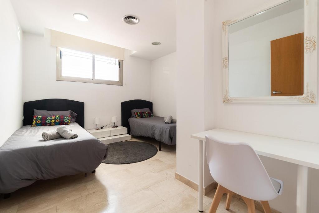 Postel nebo postele na pokoji v ubytování Apartament Granollers Up Live I