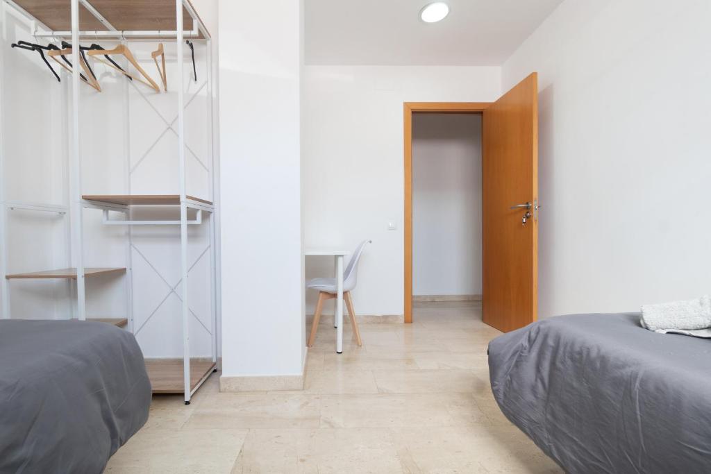 Postel nebo postele na pokoji v ubytování Apartament Granollers Up Live I