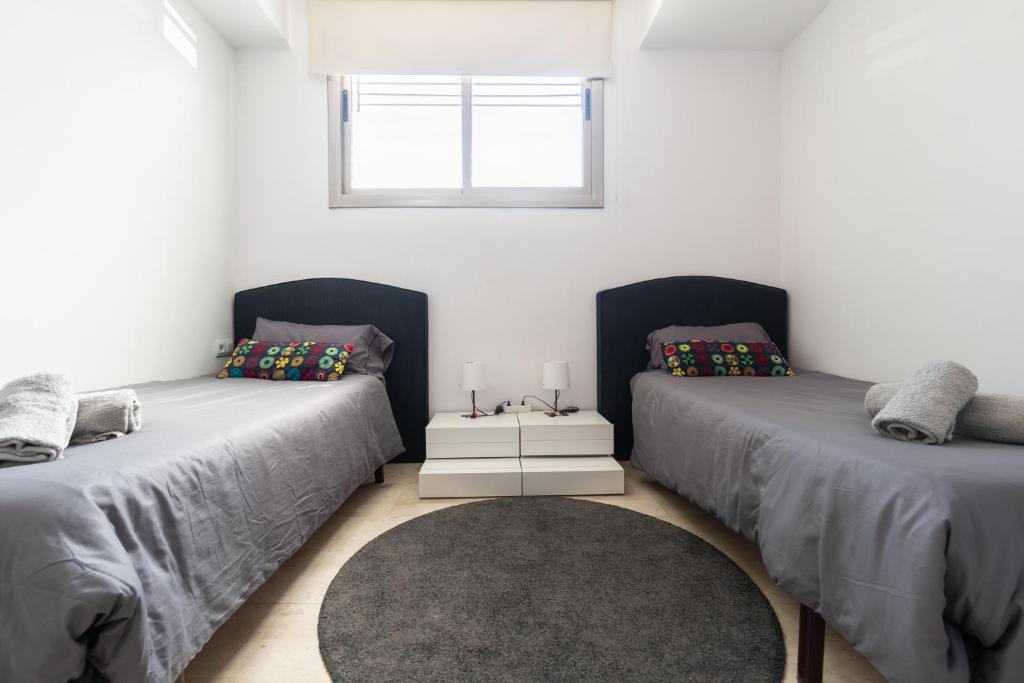 Postel nebo postele na pokoji v ubytování Apartament Granollers Up Live I