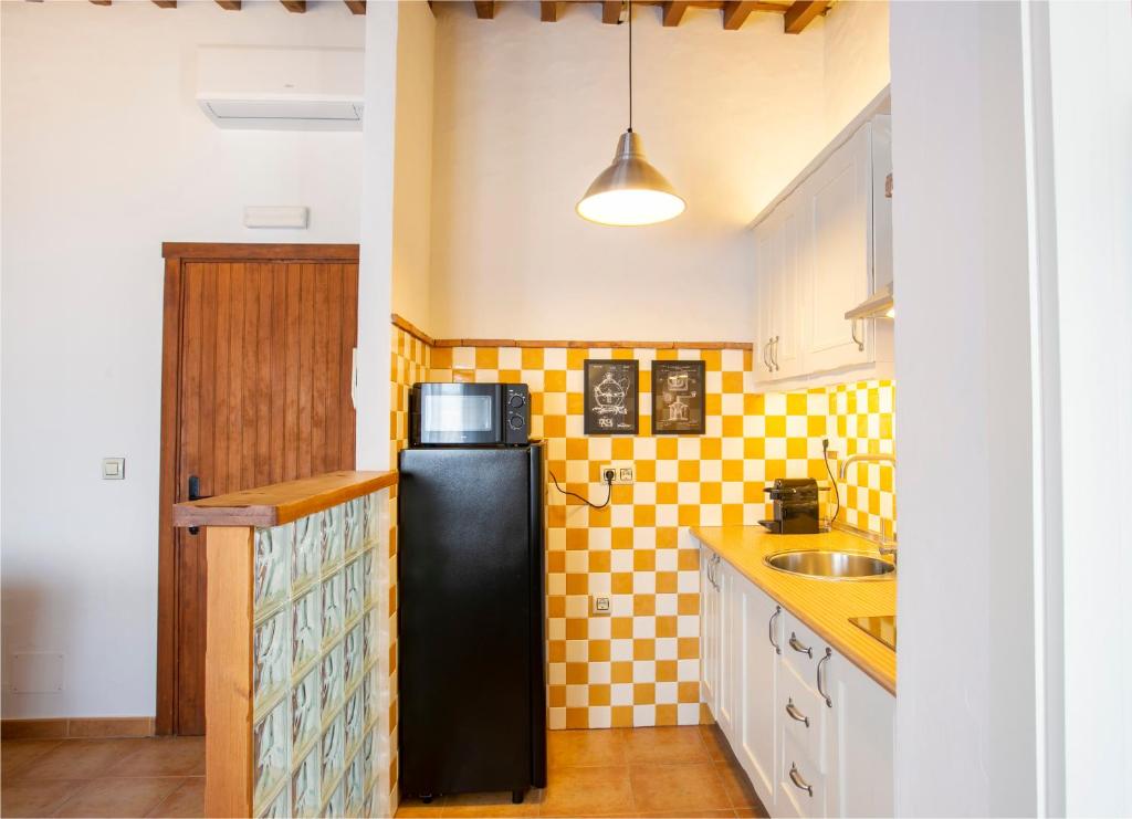 Kuchyň nebo kuchyňský kout v ubytování Estudio La Motilla