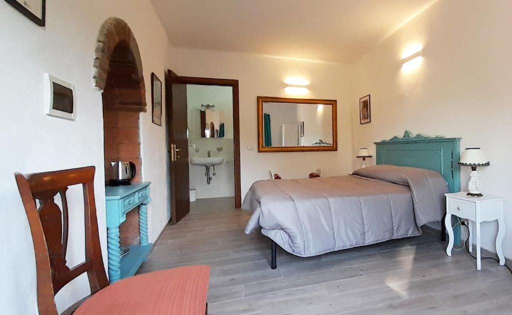 Postel nebo postele na pokoji v ubytování Borgo de' Muracci