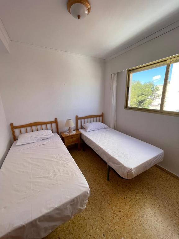 Postel nebo postele na pokoji v ubytování Apartamento en segunda linea en playa de Gandia
