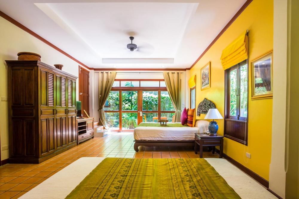 Postel nebo postele na pokoji v ubytování Rabbit Resort Pattaya