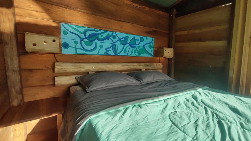 Postel nebo postele na pokoji v ubytování Monte La MaMa Ecolodge