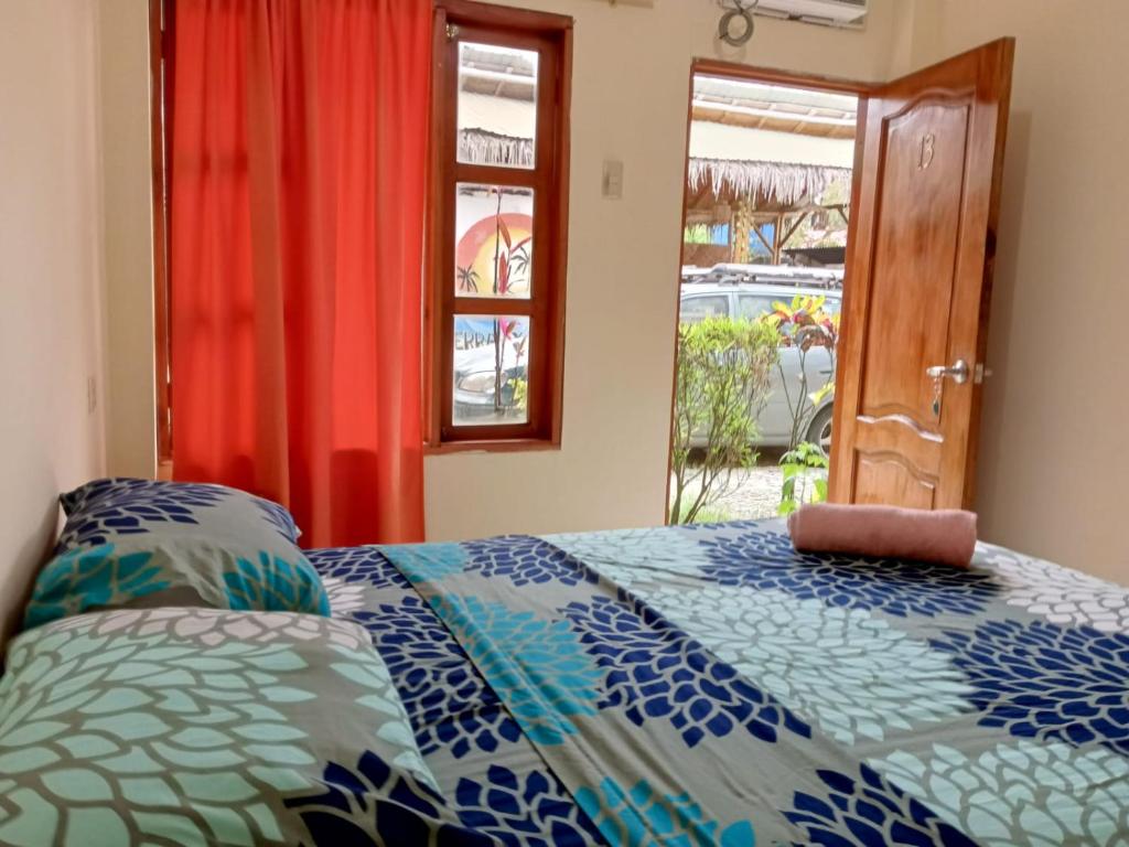 Postel nebo postele na pokoji v ubytování Hostal Tierra y Mar
