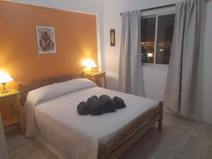 Postel nebo postele na pokoji v ubytování Depto Rawson Home