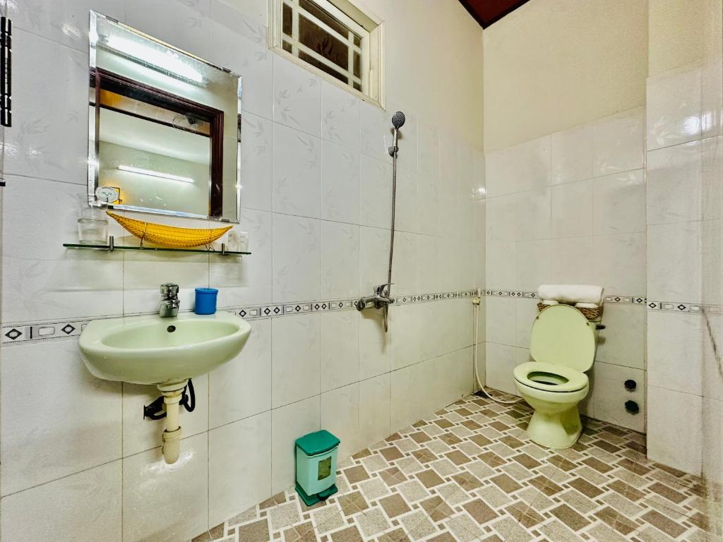 Koupelna v ubytování DK House Homestay