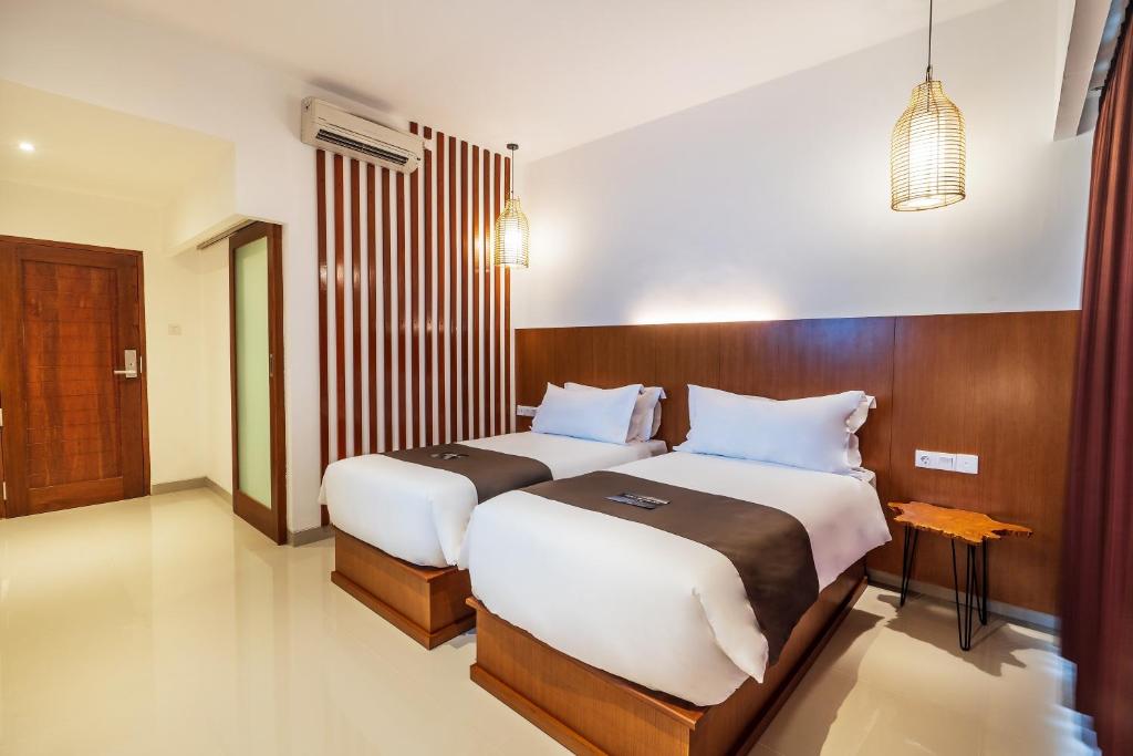 Katil atau katil-katil dalam bilik di Suka Beach Inn