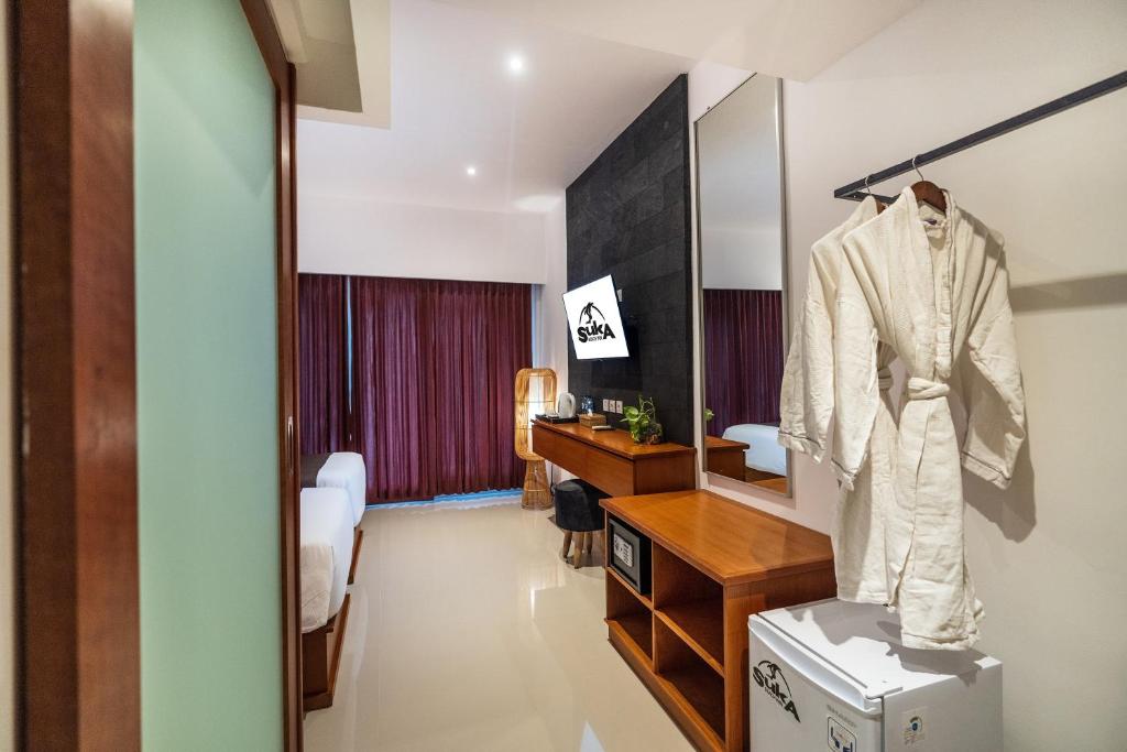 Televisyen dan/atau pusat hiburan di Suka Beach Inn