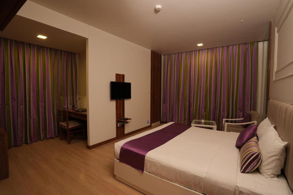 Postel nebo postele na pokoji v ubytování Hotel Hardeo