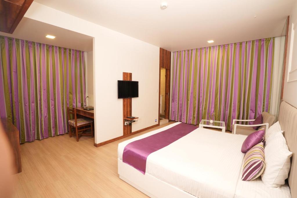 Postel nebo postele na pokoji v ubytování Hotel Hardeo