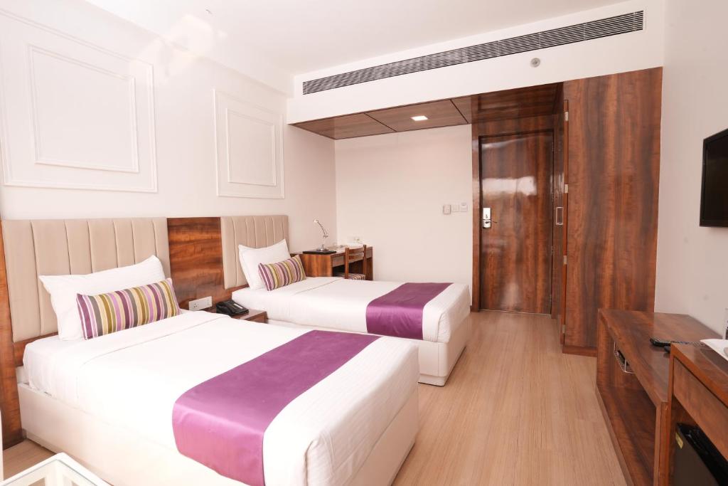 Postel nebo postele na pokoji v ubytování Hotel Hardeo