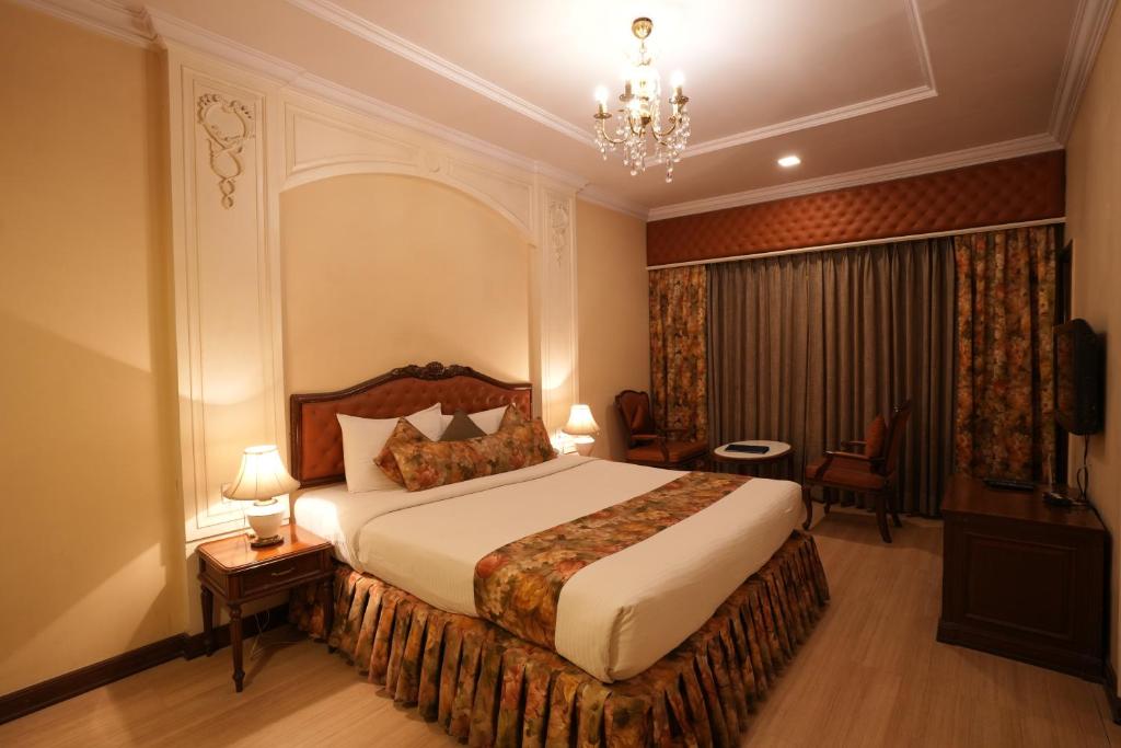 Postel nebo postele na pokoji v ubytování Hotel Hardeo