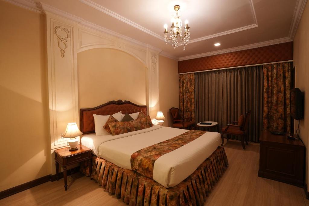 Postel nebo postele na pokoji v ubytování Hotel Hardeo