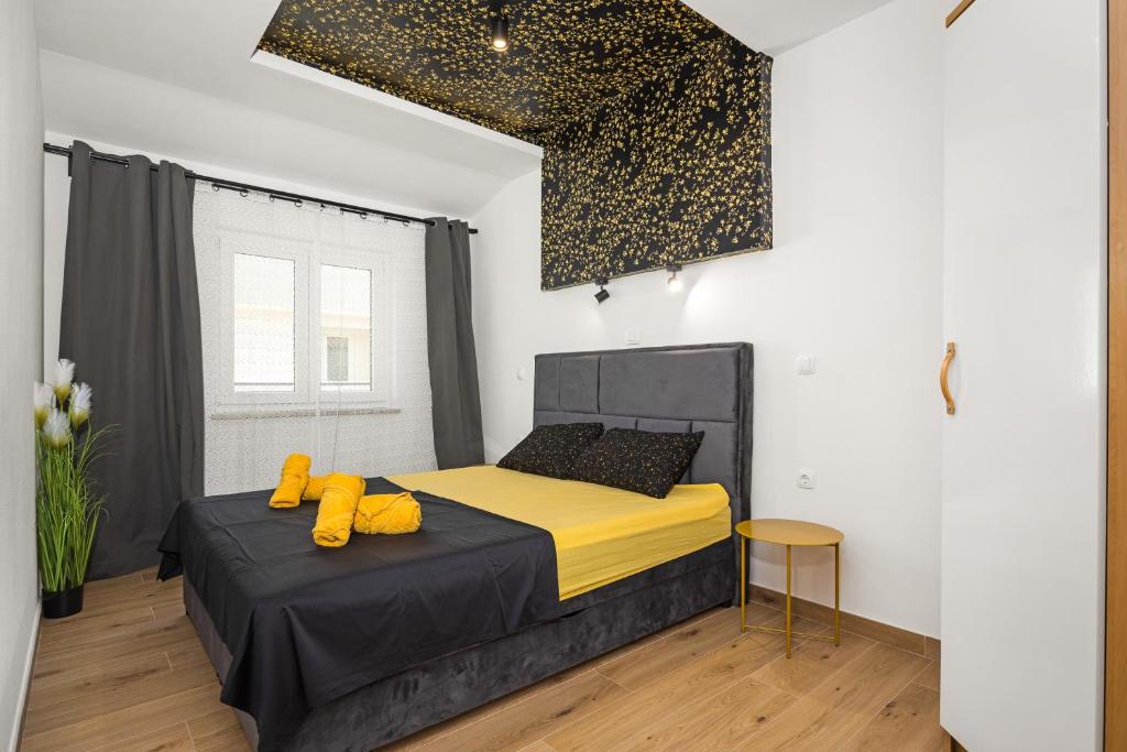 Postel nebo postele na pokoji v ubytování Luxury apartments Lotus&Lovor