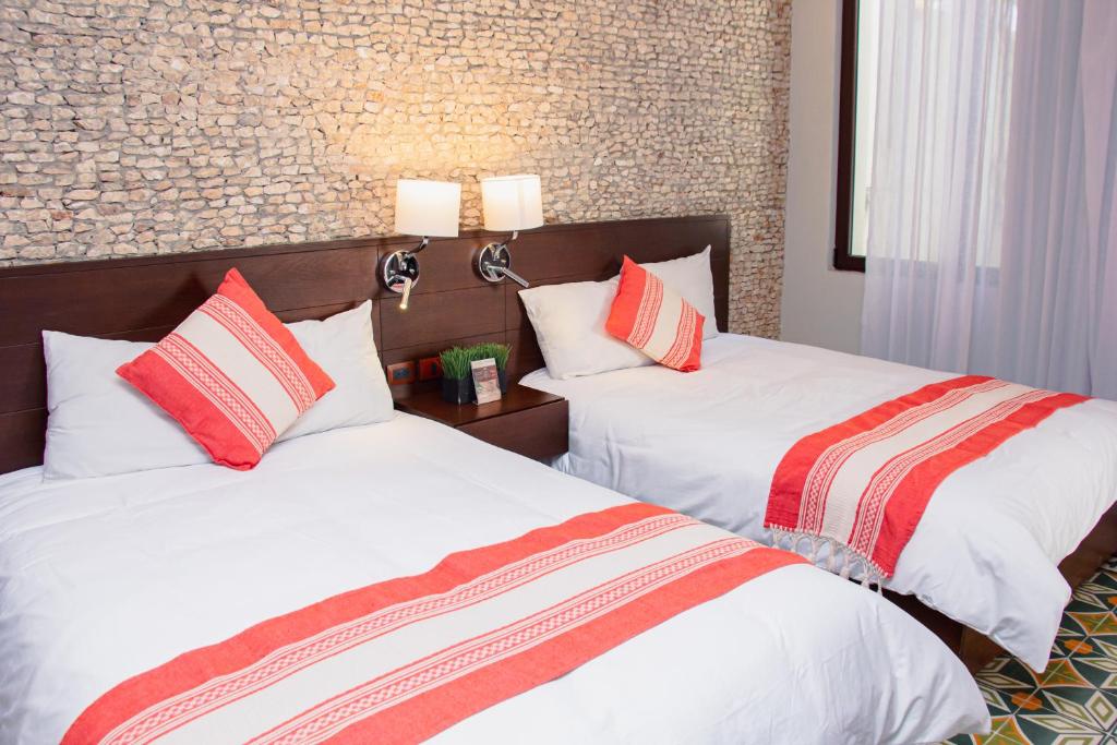 Postel nebo postele na pokoji v ubytování Hotel Marionetas