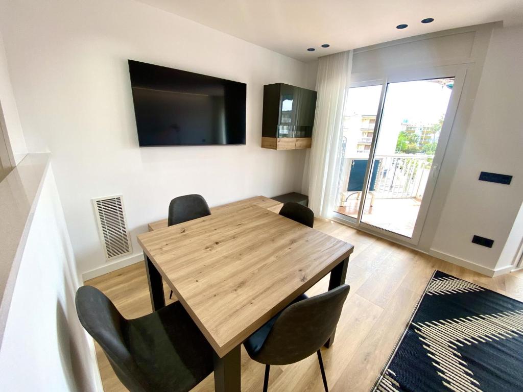 Televízia a/alebo spoločenská miestnosť v ubytovaní For a Stay Regueral Mar