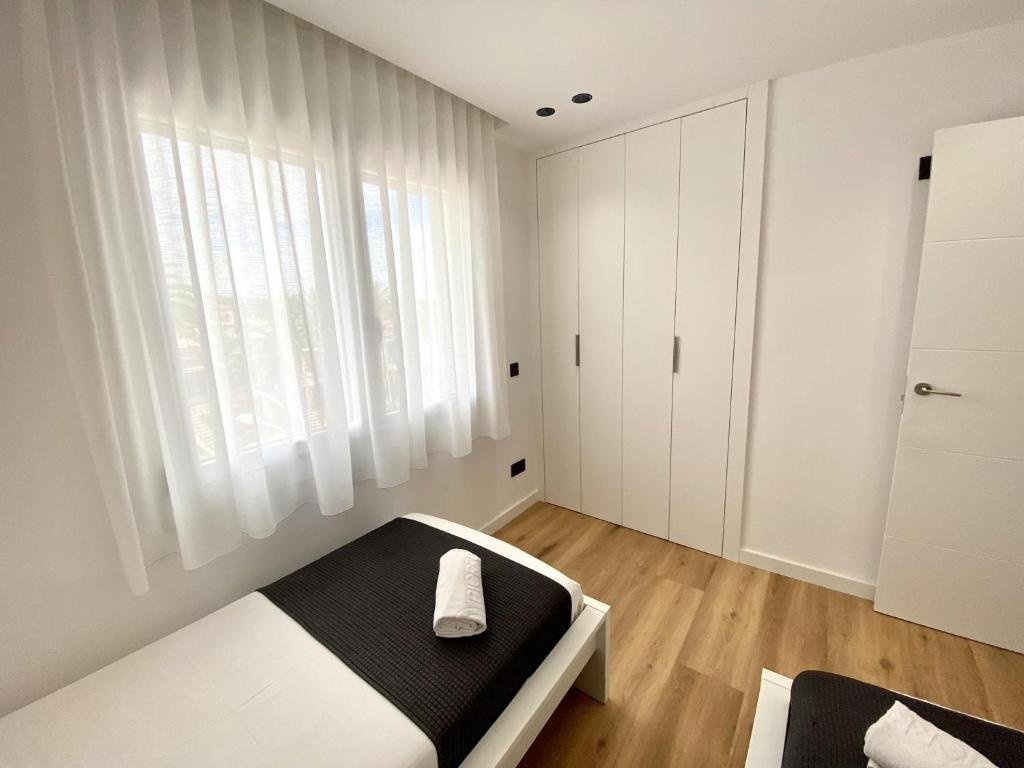Posteľ alebo postele v izbe v ubytovaní For a Stay Regueral Mar