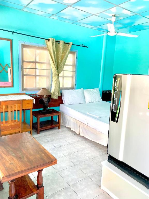 Postel nebo postele na pokoji v ubytování Koh Tao Tropicana Resort