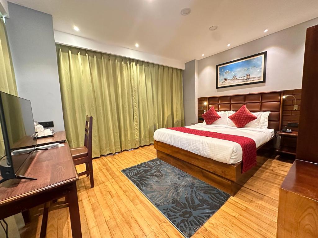 Postel nebo postele na pokoji v ubytování NUMINOUS HOTEL