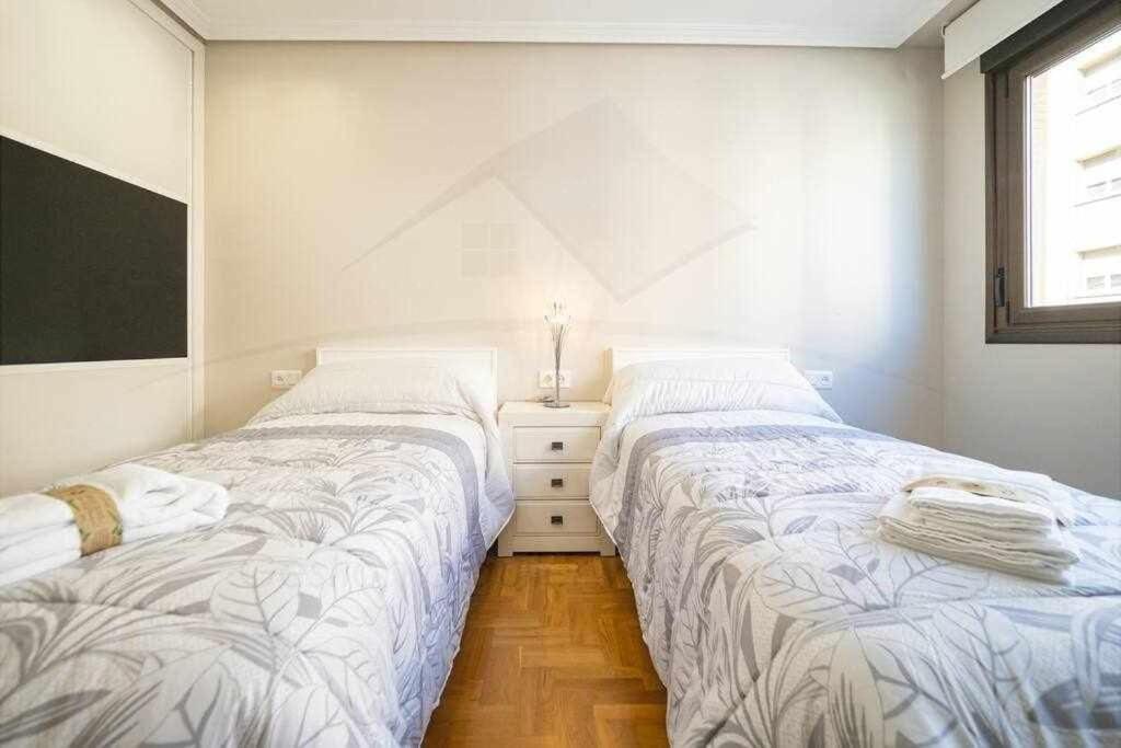 A bed or beds in a room at El Cuquiellu