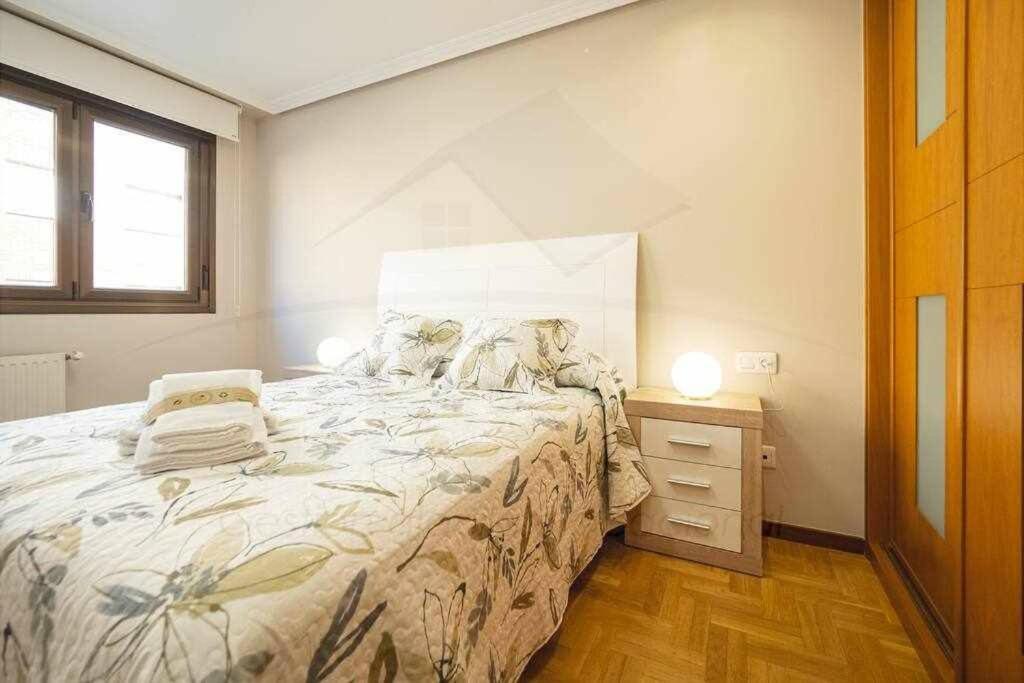 A bed or beds in a room at El Cuquiellu