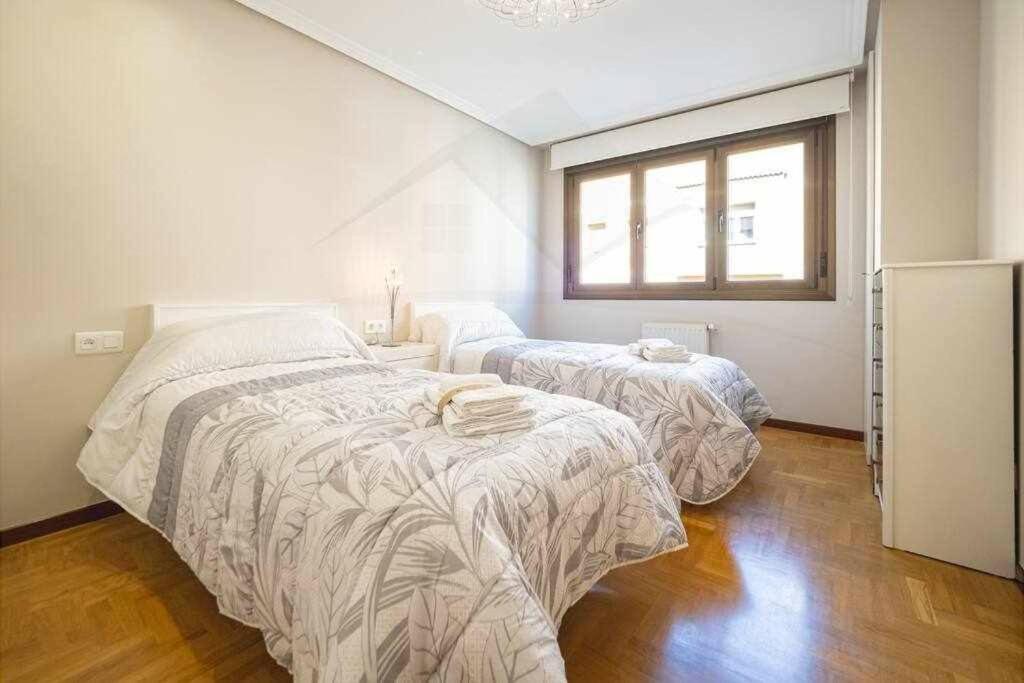 A bed or beds in a room at El Cuquiellu