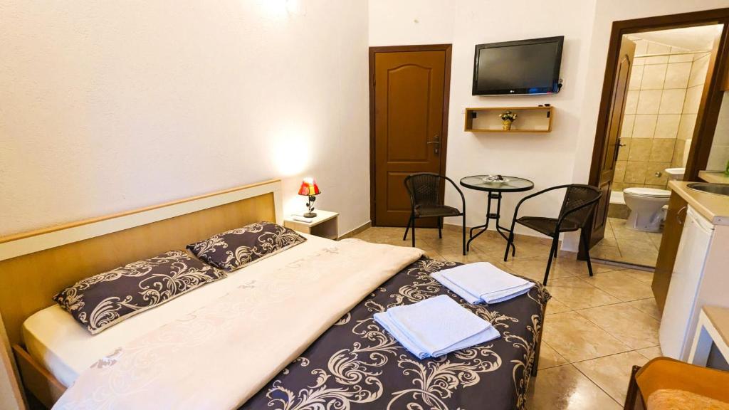 Postel nebo postele na pokoji v ubytování Apartment Sea & Mountain