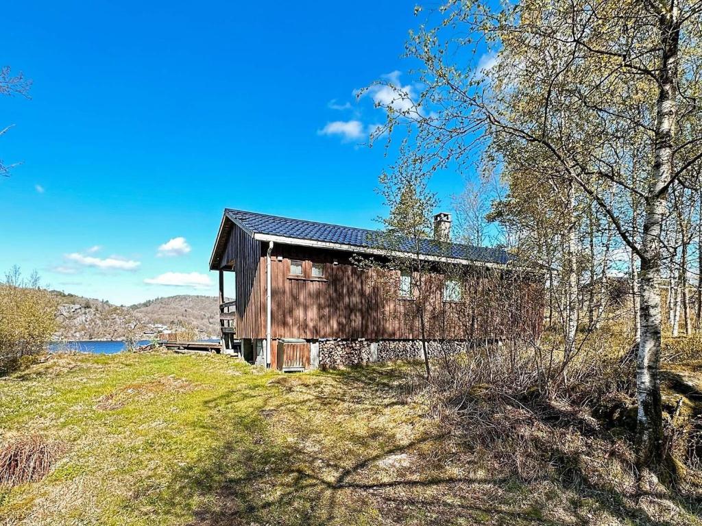 an old barn sitting on top of a hill at 5 person holiday home in FARSUND-By Traum in Helle