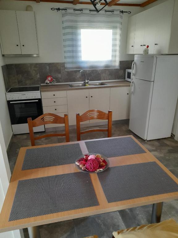 Kuchyň nebo kuchyňský kout v ubytování Cosmitsa House