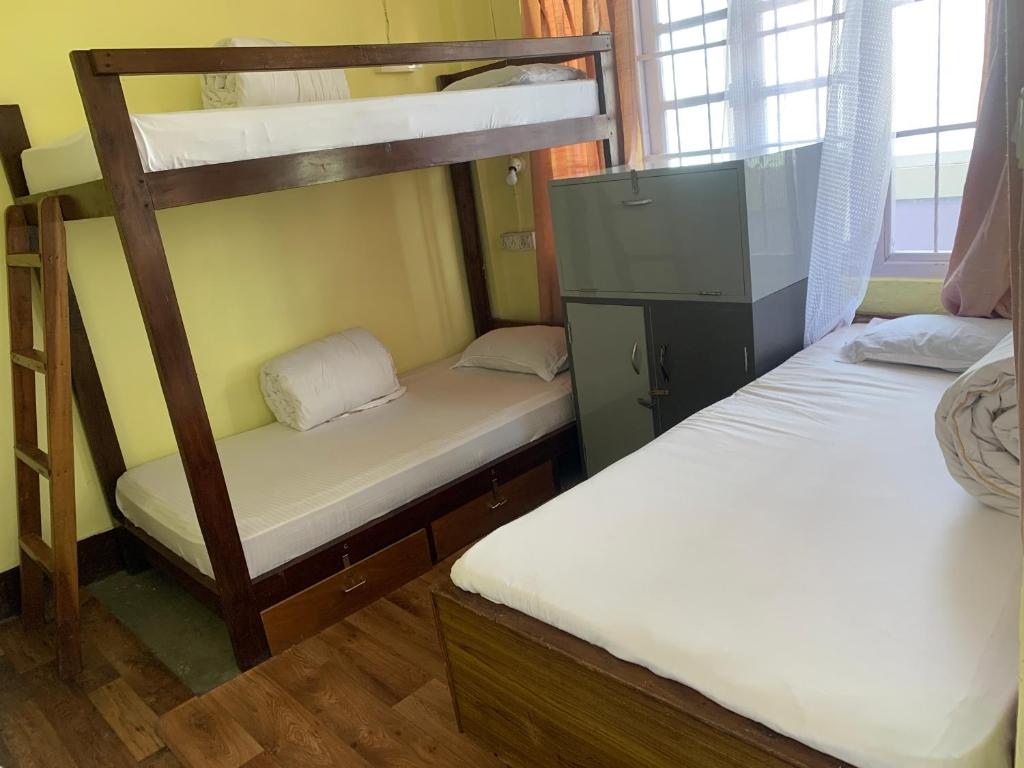 Postel nebo postele na pokoji v ubytování Hideout Backpackers Hostel