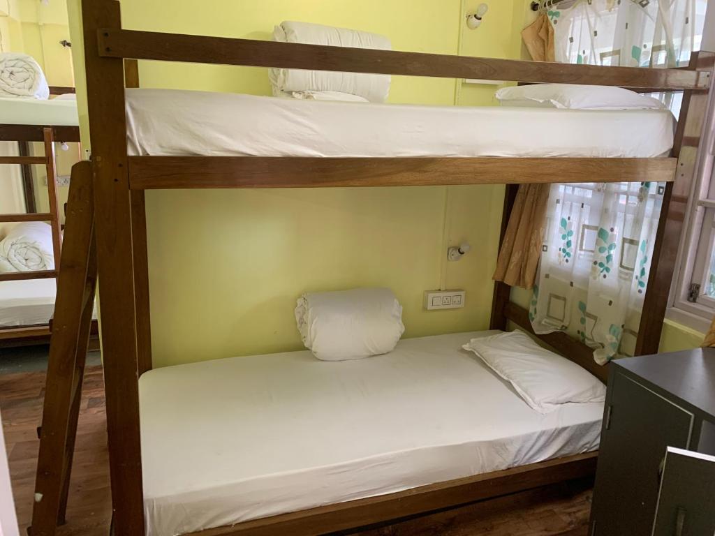 Postel nebo postele na pokoji v ubytování Hideout Backpackers Hostel
