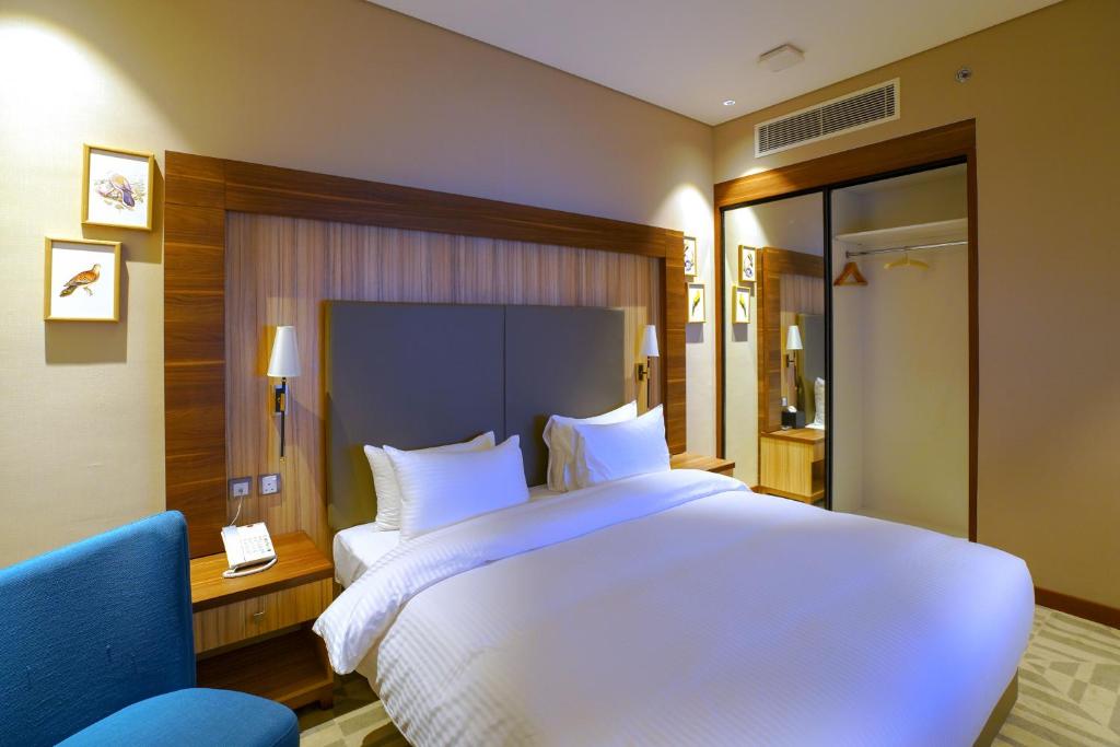 Letto o letti in una camera di Al Aseel Hotel