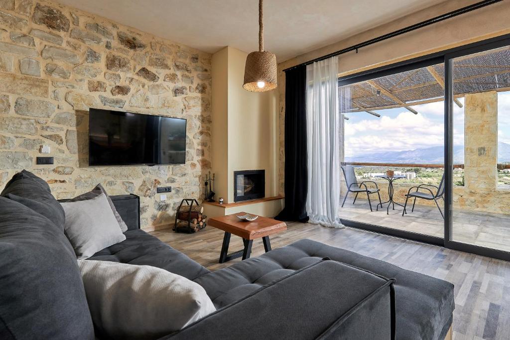 A television and/or entertainment centre at Alagni Cretan Resort