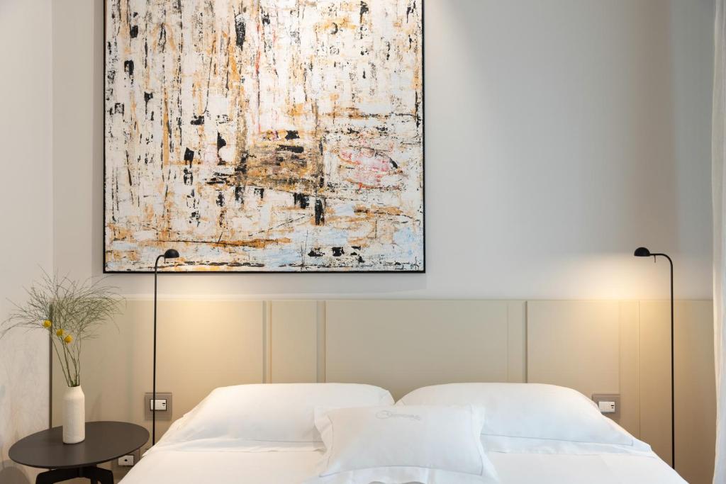 Postel nebo postele na pokoji v ubytování Taodomus Boutique Hotel