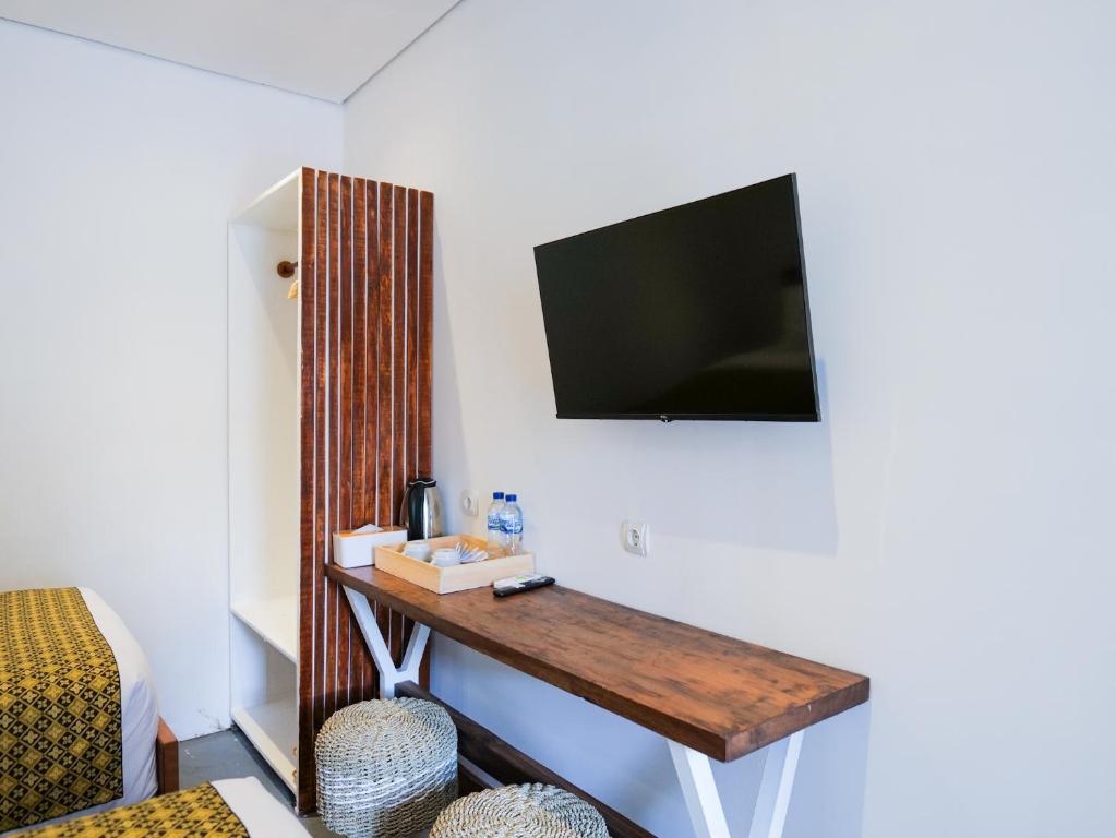 TV a/nebo společenská místnost v ubytování Cactus Guest House Borobudur