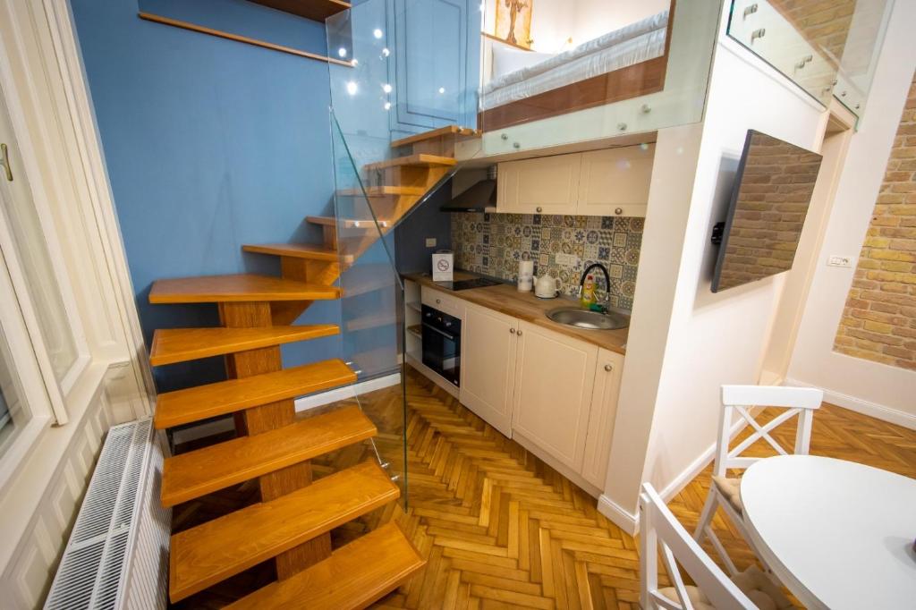 Kuchyň nebo kuchyňský kout v ubytování VISAJ Deluxe Downtown
