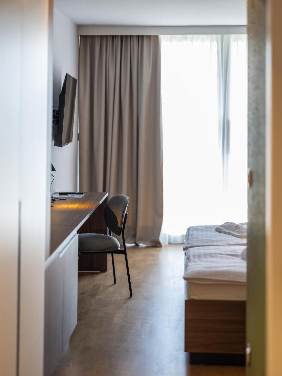 TV a/nebo společenská místnost v ubytování Hotel Villa Rosetta