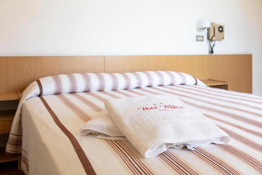 Postel nebo postele na pokoji v ubytování Hotel Milton