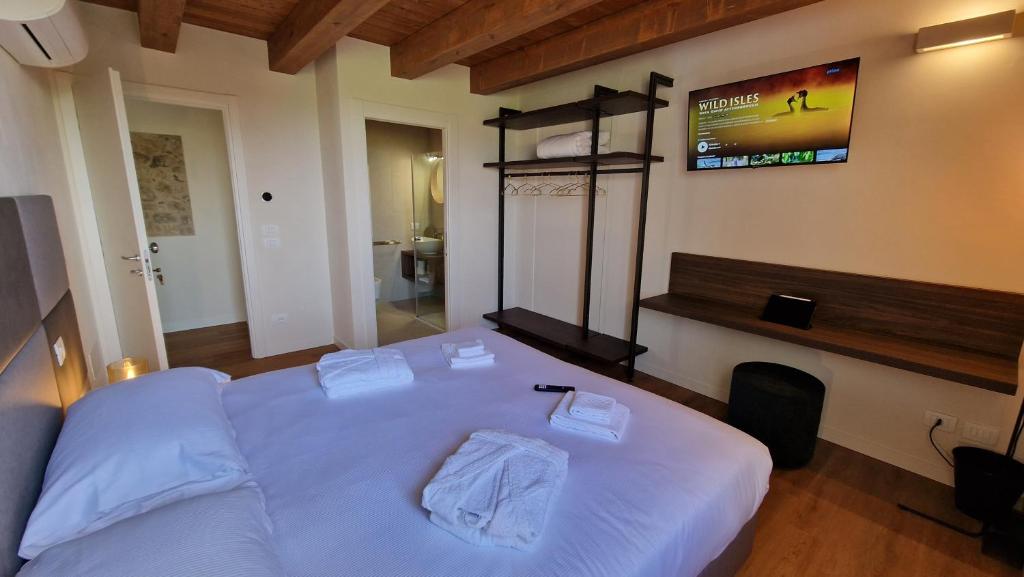Postel nebo postele na pokoji v ubytování Casa Ossan